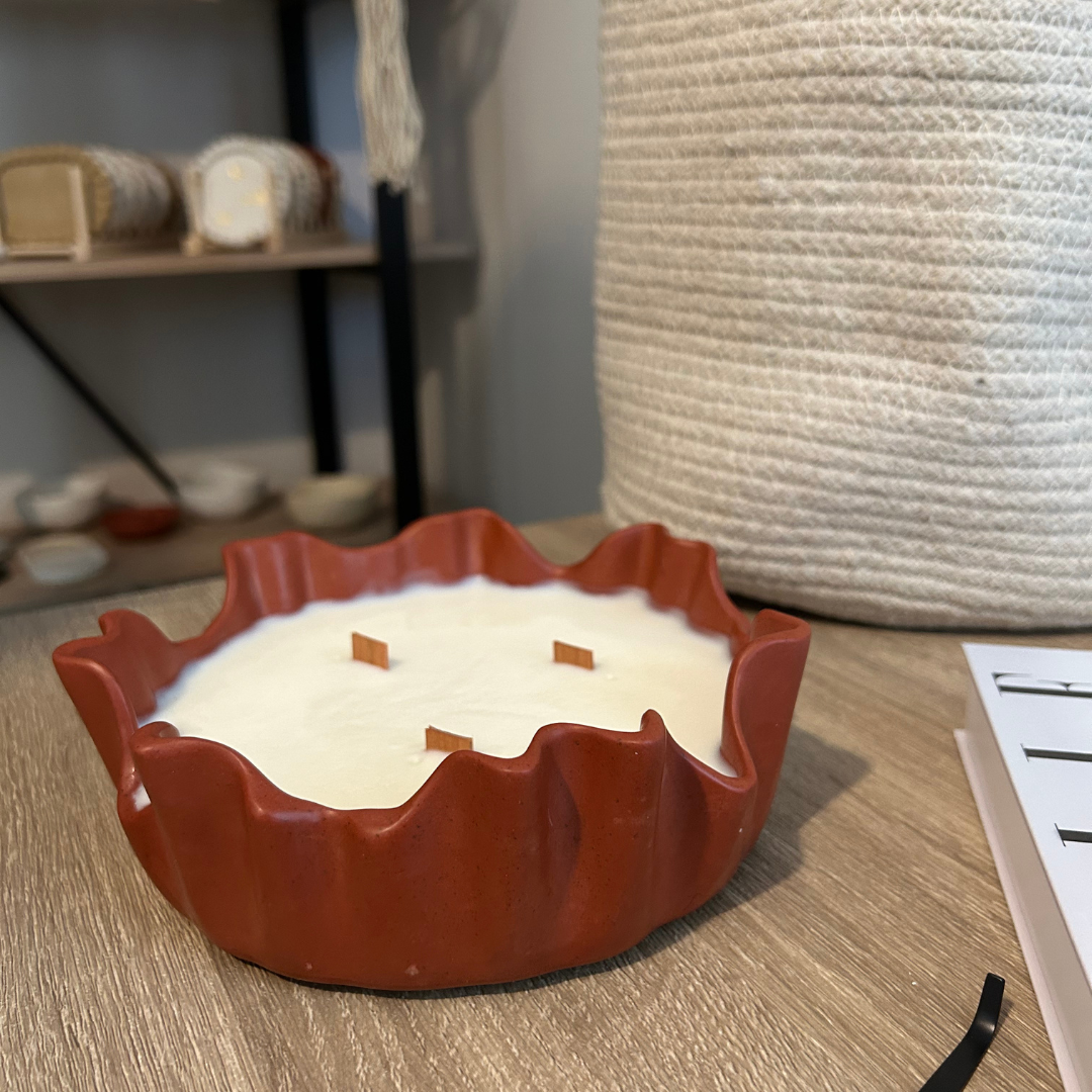 Asymmetrical bowl candle